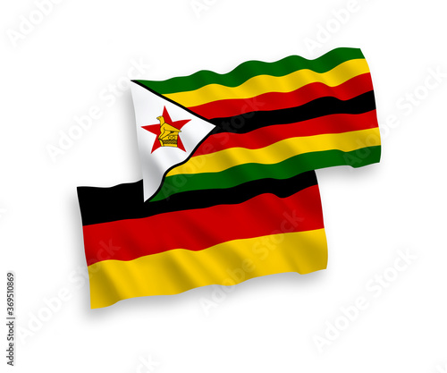 Flags of Zimbabwe and Germany on a white background