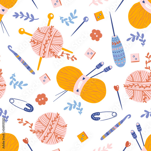 Cute vector seamless pattern with knitting tools