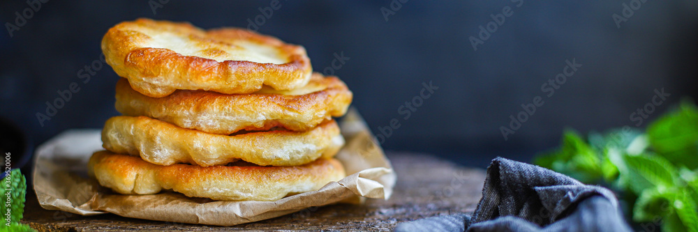 wrap flat bread tortillas from flour and water fried dough homemade cooking Takeaway handmade langos food background top view copy space wrap flat bread tortillas from flour and water fried dough homemade cooking Takeaway handmade langos food background top view copy space