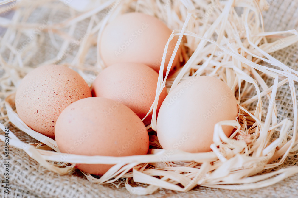 Eggs over jute sack background. Happy easter. Eggs over jute sack background. Happy easter.