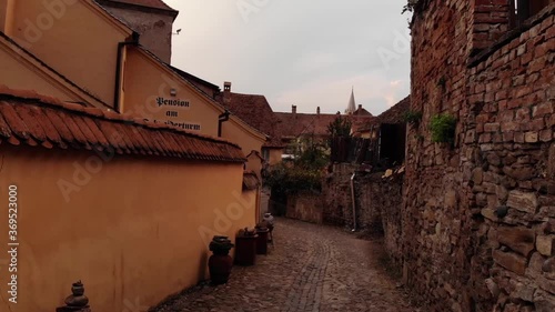 First person view of a drunkard walking on the streets of a medieval city photo