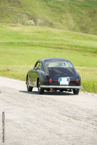 Classic car at Mille Miglia italian race photo