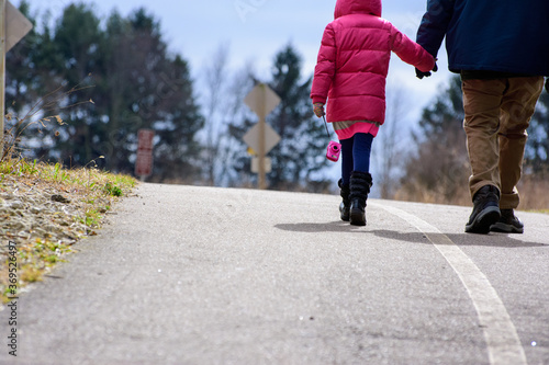 Father and daughter walking