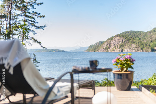 Sun lounger by a fjord in Norway © Luke