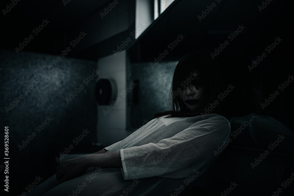 Portrait of asian woman make up ghost face,Horror scene,Scary background,Halloween poster Portrait of asian woman make up ghost face,Horror scene,Scary background,Halloween poster