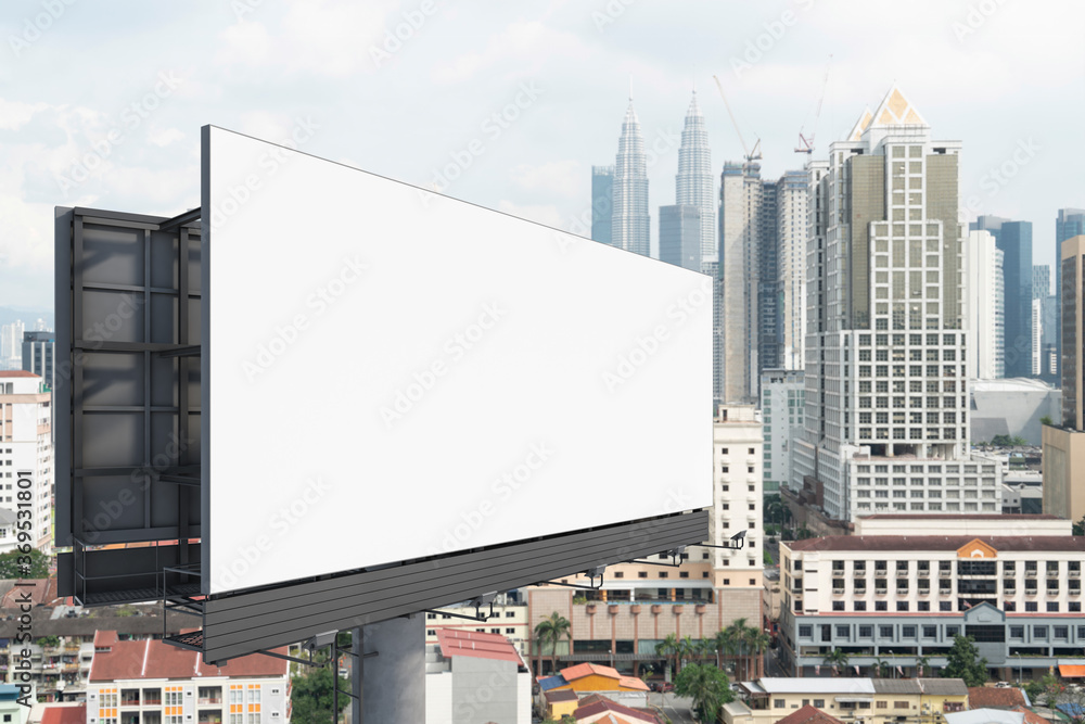 Blank white road billboard with KL cityscape background at day time. Street advertising poster, mock up, 3D rendering. Side view. The concept of marketing communication to promote or sell idea.