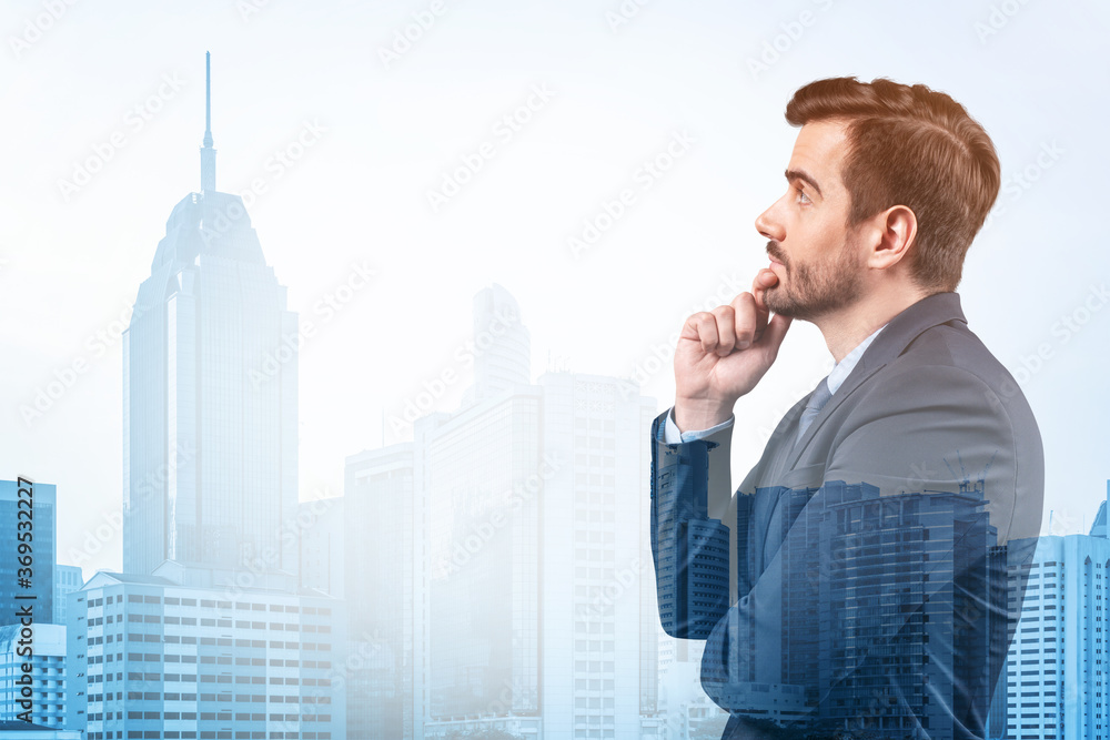 Fototapeta premium Young handsome businessman in suit with hand on chin thinking how to succeed, new career opportunities, MBA. Kuala Lumpur on background. Double exposure.