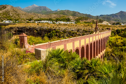 A view along the top storey of the majestic  four storey  Eagle Aqueduct that spans the ravine of Cazadores near Nerja  Spain in the summertime