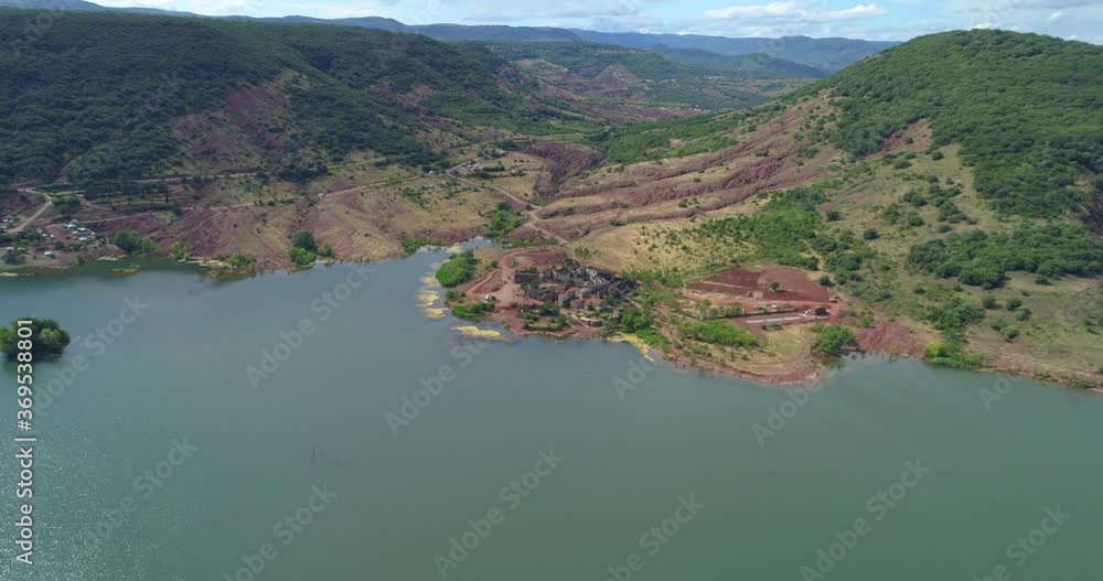 Boat on Salagou lake - aerial traveling Boat on Salagou lake - aerial traveling