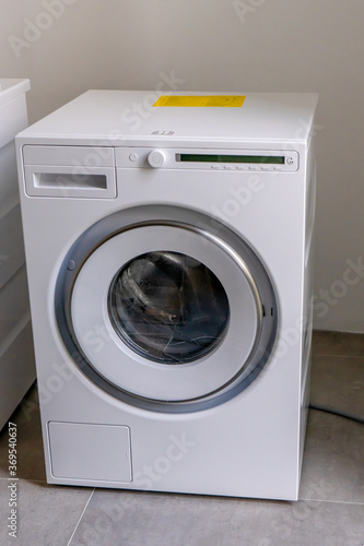 Wallpaper Mural New beautiful washing machine. Modern electronic equipment. Hight quality photo Torontodigital.ca