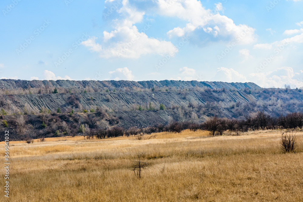 Slag heaps near the iron quarry. Mining industry Slag heaps near the iron quarry. Mining industry