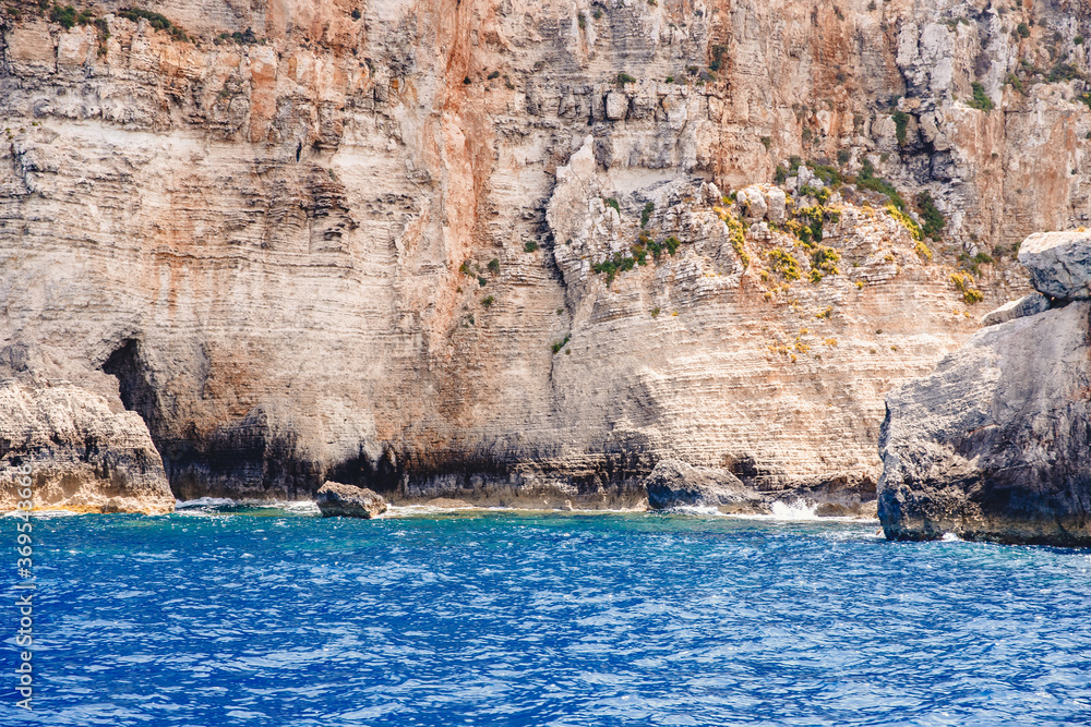 Panorama beach Blue Lagoon Comino Malta. Rocky coast with window and arch Mediterranean Sea
