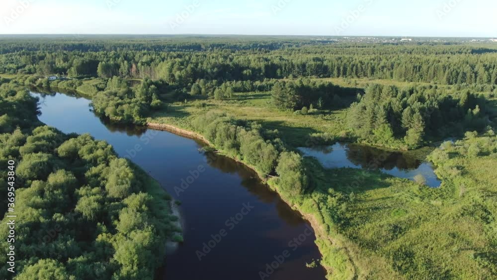 Forest river in the summer taiga from a height of flight Forest river in the summer taiga from a height of flight