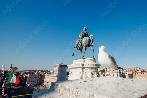 Monument of Vittorio Emmanuel on Venice Square in Rome Italy, blue sky © Parilov