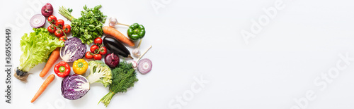 top view of colorful assorted fresh vegetables on white background, panoramic shot