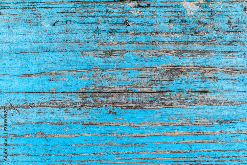Texture of an old blue wooden board. Rough surface. Background Texture of an old blue wooden board. Rough surface. Background