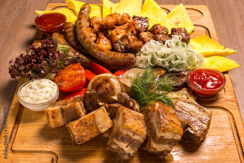 Large grill set on a wooden board © 977_rex_977