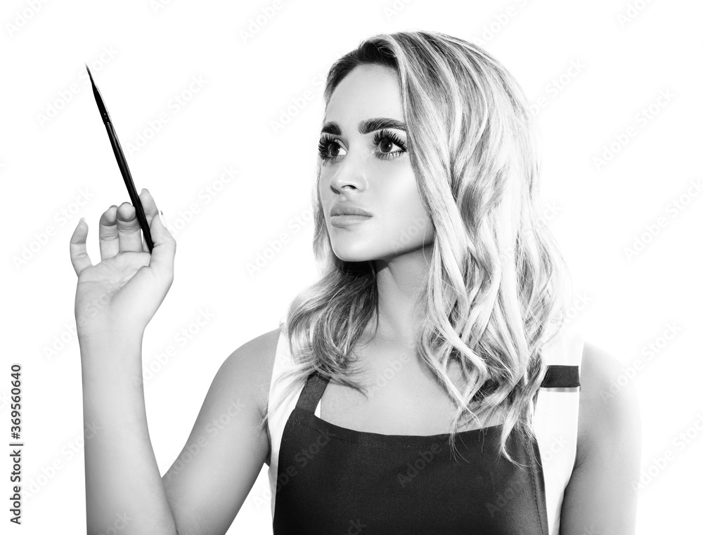 Beautiful brows master woman holds brush. Isolated on white background. Beautiful brows master woman holds brush. Isolated on white background.