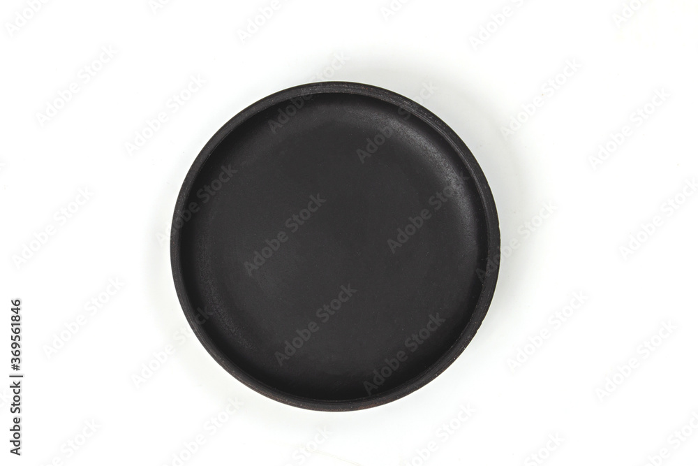 Black empty plate isolated on white background. Black empty plate isolated on white background.
