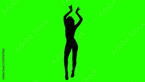 Beautiful Slim Girl Dancing On a Green Background. Sexual Female Silhouette with Alpha Channel.
