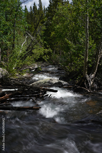 Small waterfall in the woods in colorado- Rocky mountain national park