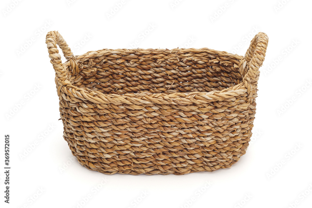 Obraz premium Wicker basket isolated on white background