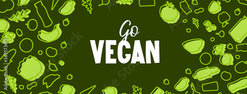 Go Vegan text and vegetable pattern on green.