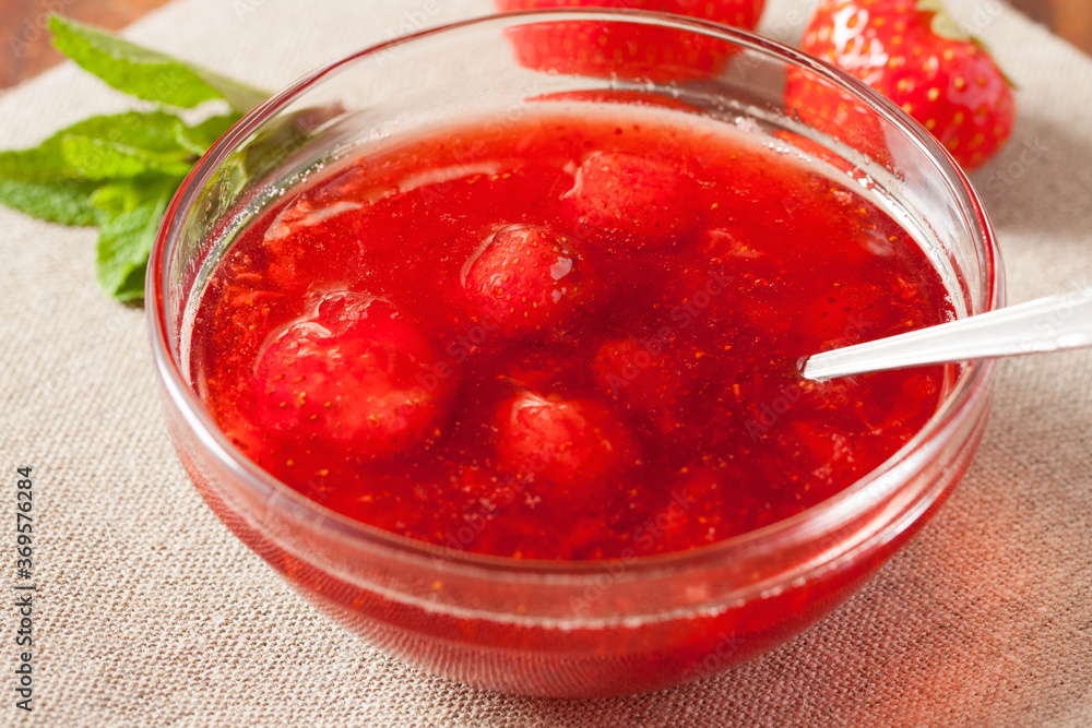 Jam Of Strawberries In Glass Bowl Close Up. Jam Of Strawberries In Glass Bowl Close Up.