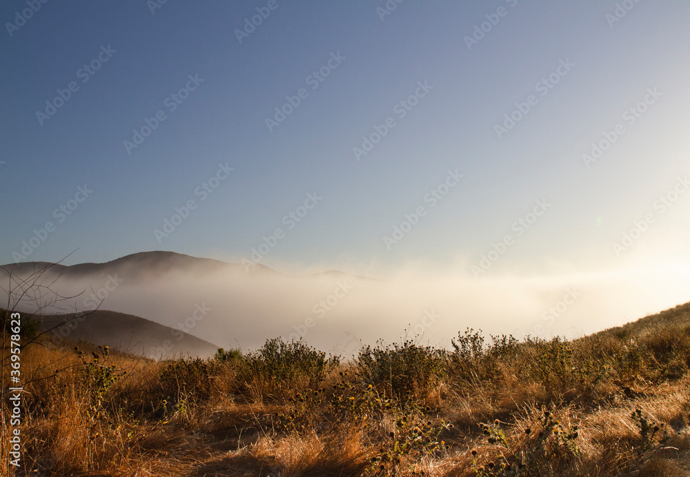 Fog on the mountaintop in the desert of California