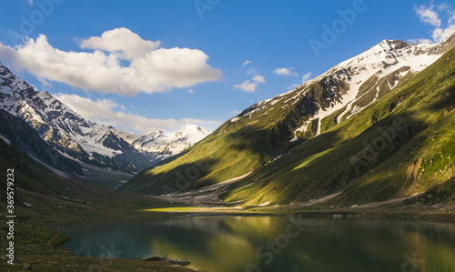 Panoramic view of Saiful Maluk National Park Naran in  Pakistan with a clear blue sky background photo