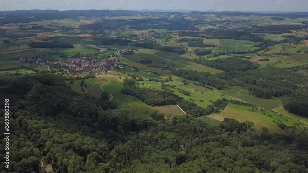 Aerial panoramic view over the long extinct volcanoes of the Hegau region towards Lake Constance in Germany. Aerial panoramic view over the long extinct volcanoes of the Hegau region towards Lake Constance in Germany.