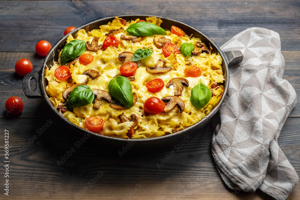 casserole  pasta with mushrooms, sausage and cheese