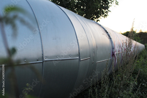 large metal pipe in the grass