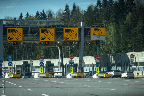 Payment point on the Western high-speed diameter toll road, cars are waiting in line.