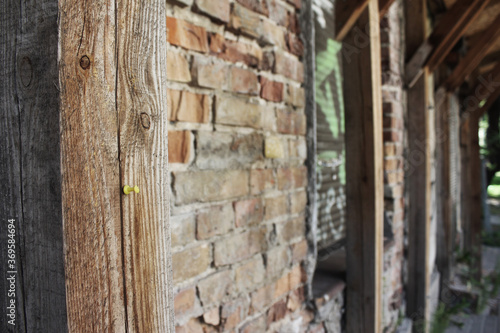 old dilapidated brick building with graffiti