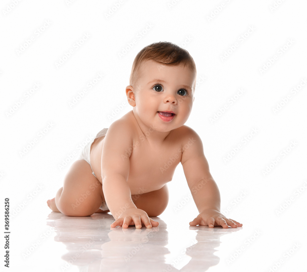 Portrait of sweet cute crawling baby boy toddler in diapers over white background Portrait of sweet cute crawling baby boy toddler in diapers over white background