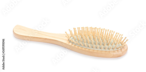 New wooden hair brush isolated on white