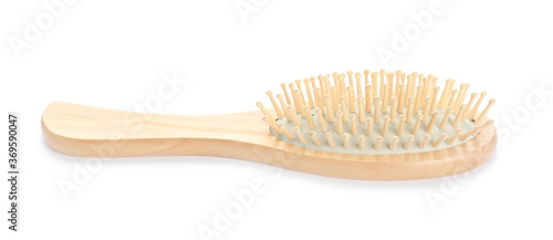 New wooden hair brush isolated on white