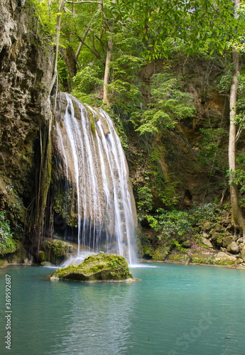 Erawan waterfall with green tree and blue lake