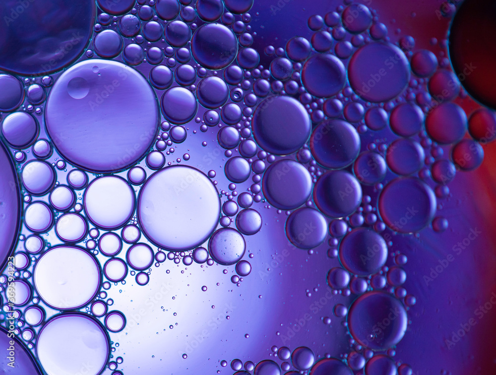 Abstract oil and water droplets on colouful background and beautiful theme.