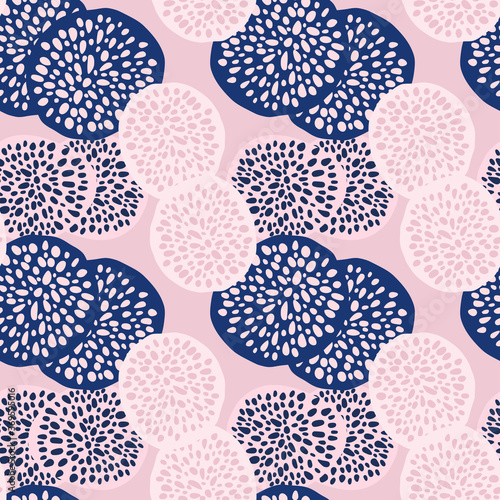 Bright pastel dot circles seamless pattern. Light pink background with white and navy blue figures.