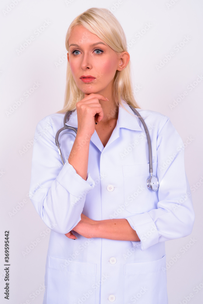 Portrait of young beautiful woman doctor with blond hair Portrait of young beautiful woman doctor with blond hair