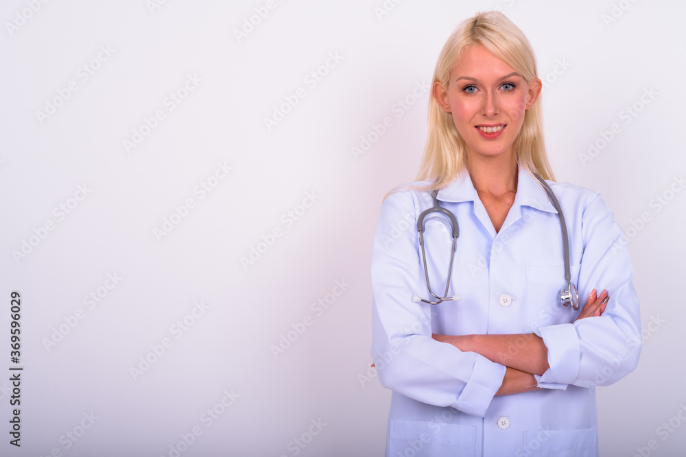 Portrait of young beautiful woman doctor with blond hair Portrait of young beautiful woman doctor with blond hair