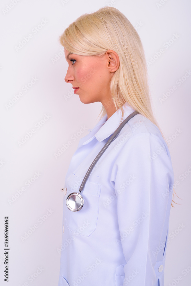 Portrait of young beautiful woman doctor with blond hair Portrait of young beautiful woman doctor with blond hair
