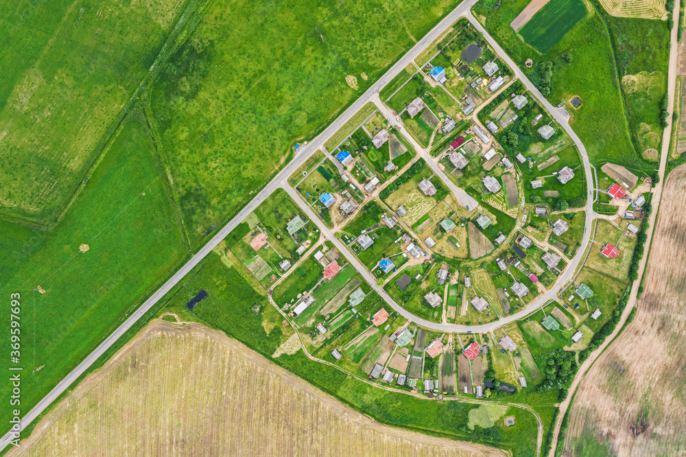 planned residential community in countryside. rural summer landscape, aerial top view