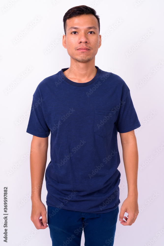 Portrait of young Asian man with beard stubble Portrait of young Asian man with beard stubble
