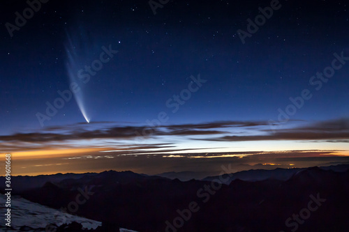 Bright comet in starry sky. Named for the astronomer who first spotted it, Comet McNaught had been unknown to science only four months earlier. It won't be seen again until the 3400's.