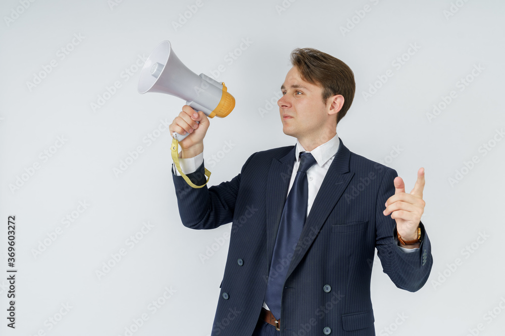 Portrait of a businessman who holds a jacket on his shoulder. The face is not visible. White background. Business and finance concept Portrait of a businessman who holds a jacket on his shoulder. The face is not visible. White background. Business and finance concept
