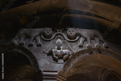 Obraz na płótnie two lions and an eagle carved in column stone inside the Geghard Monastery w salonie