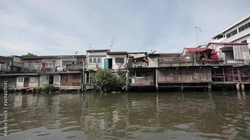 River houses in Bangkok Thailand with old and new houses 120 FPS River houses in Bangkok Thailand with old and new houses 120 FPS